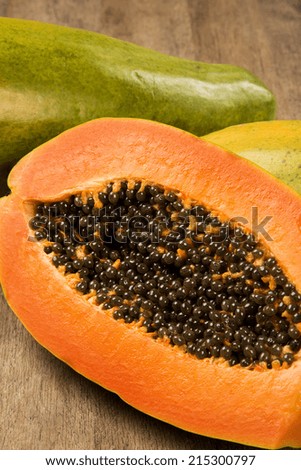 fresh cut juicy tropical papaya mamao fruit with seeds at brazil