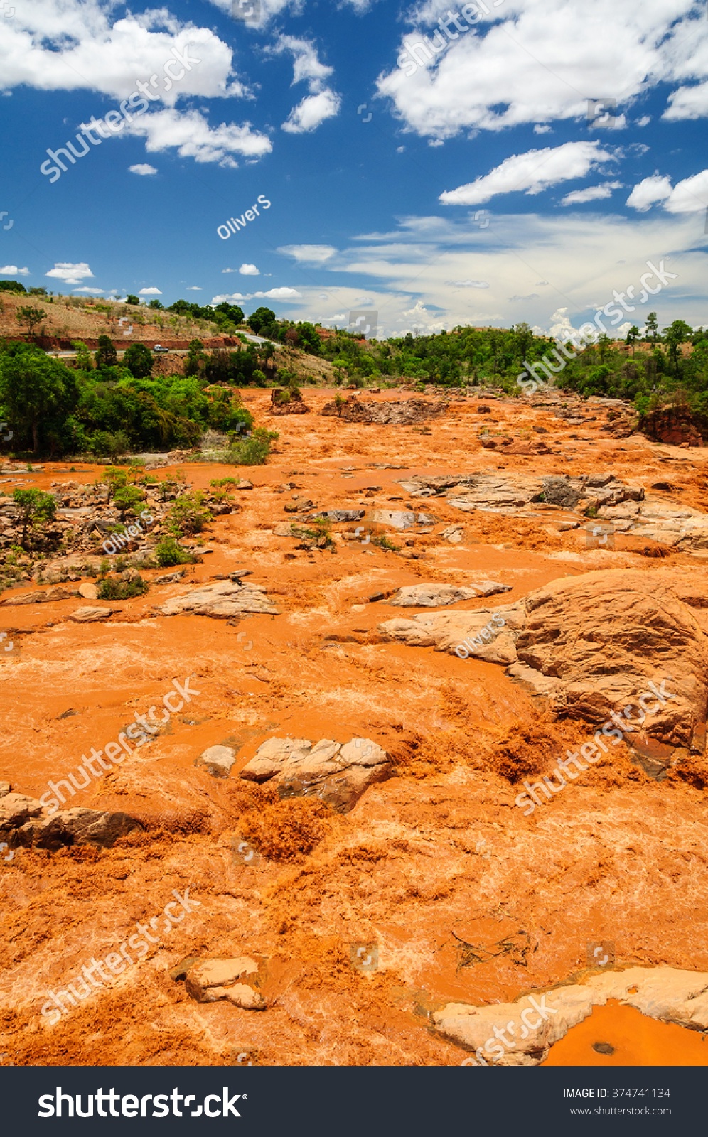 betsiboka river rapids in rain season with red sediments